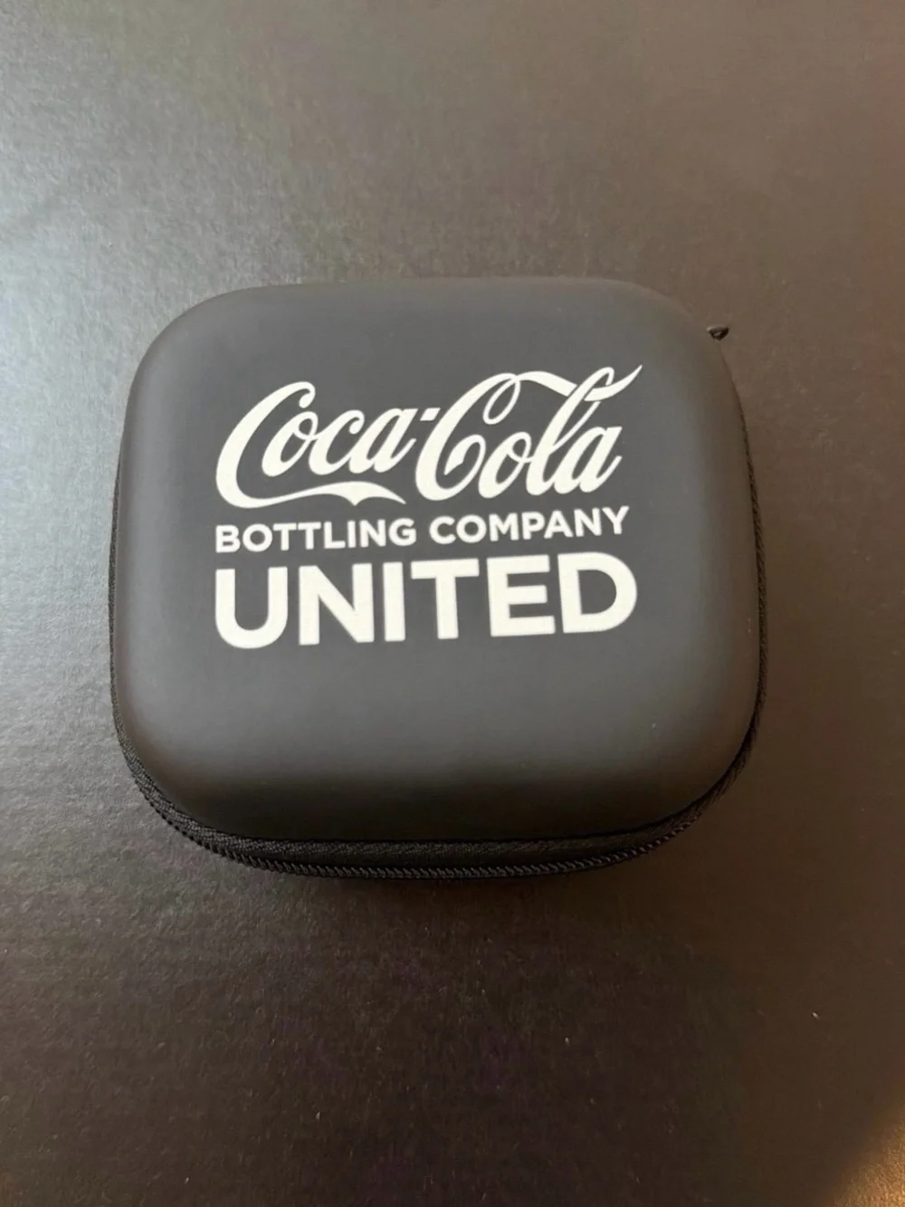 Coca Cola carrying cola